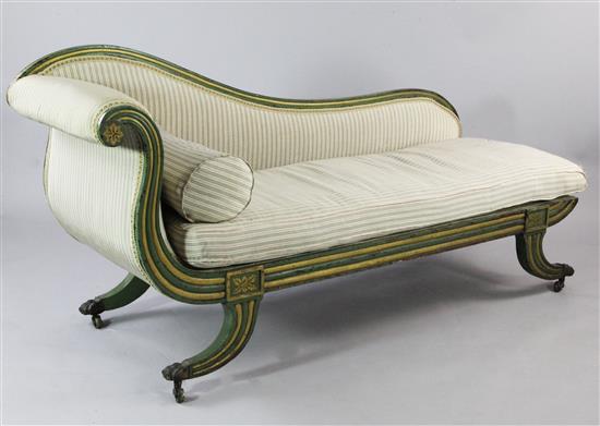 A Regency green painted and parcel gilt scroll end chaise longue,